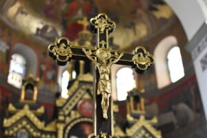 gold and black crucifix