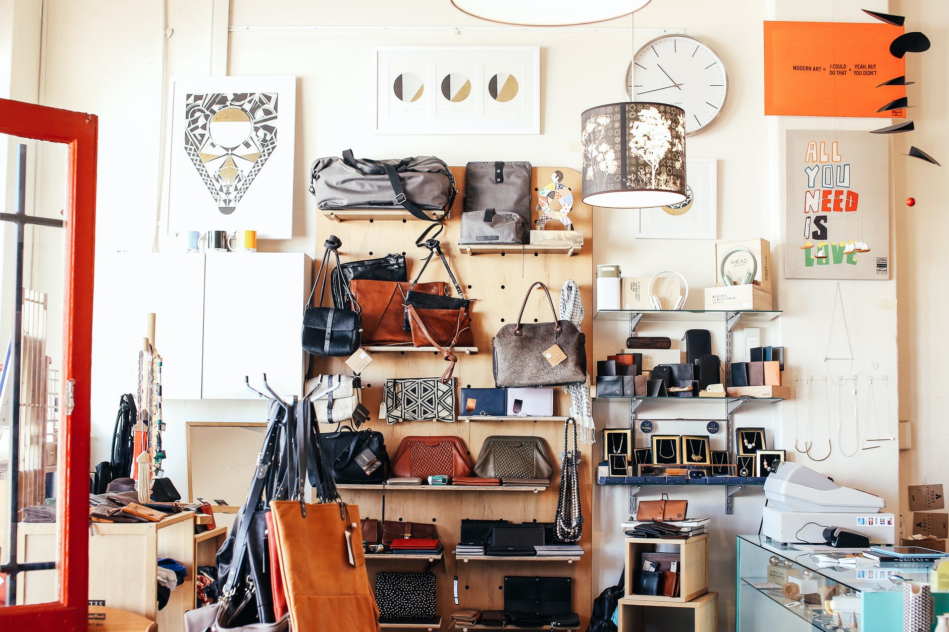assorted purses on shelves in shop