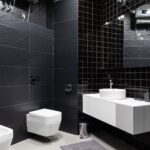 interior of restroom decorated with black tile