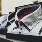 selective focus photography white button up collared top