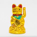 golden figurine of a cat image